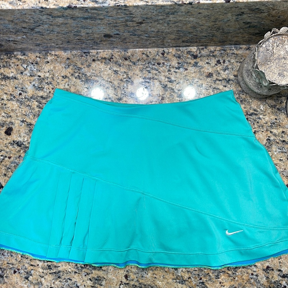 Nike skort. Size small. Green with blue trim